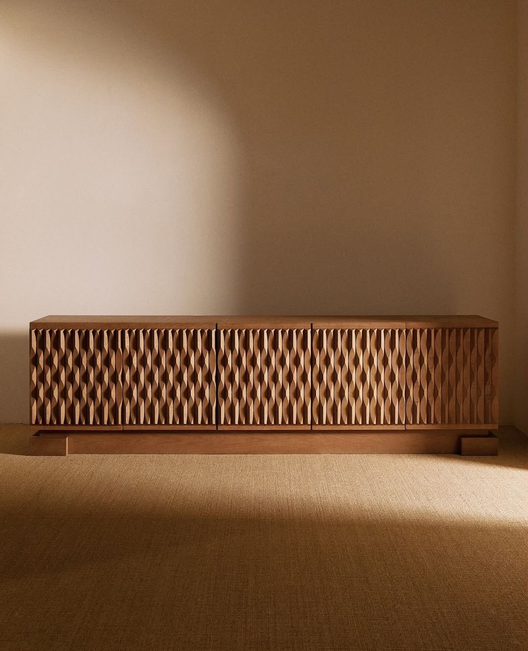 Carved geometric timber sideboard